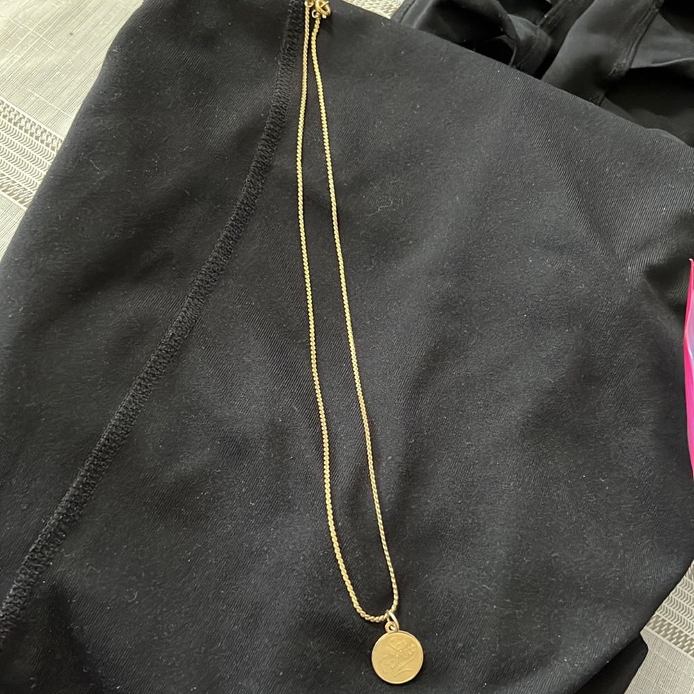 Gold plated chain with medal Says “San Francisco”